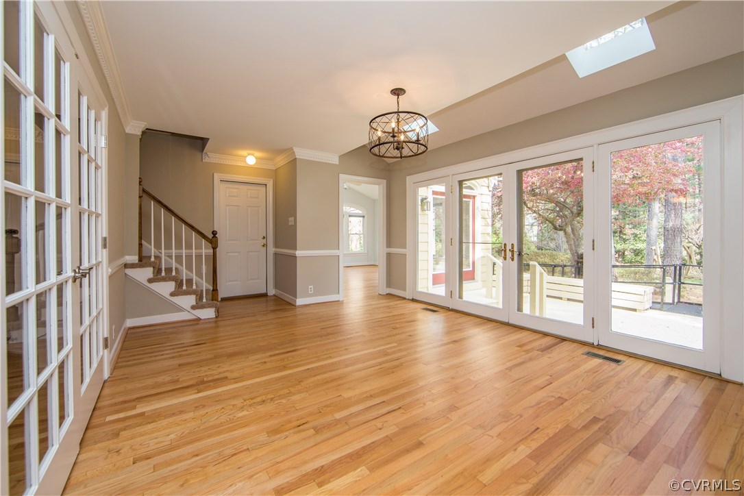 14430 West Salisbury Road Midlothian, VA 23113 - Photo 6 of 36 a view of an entryway with wooden floor