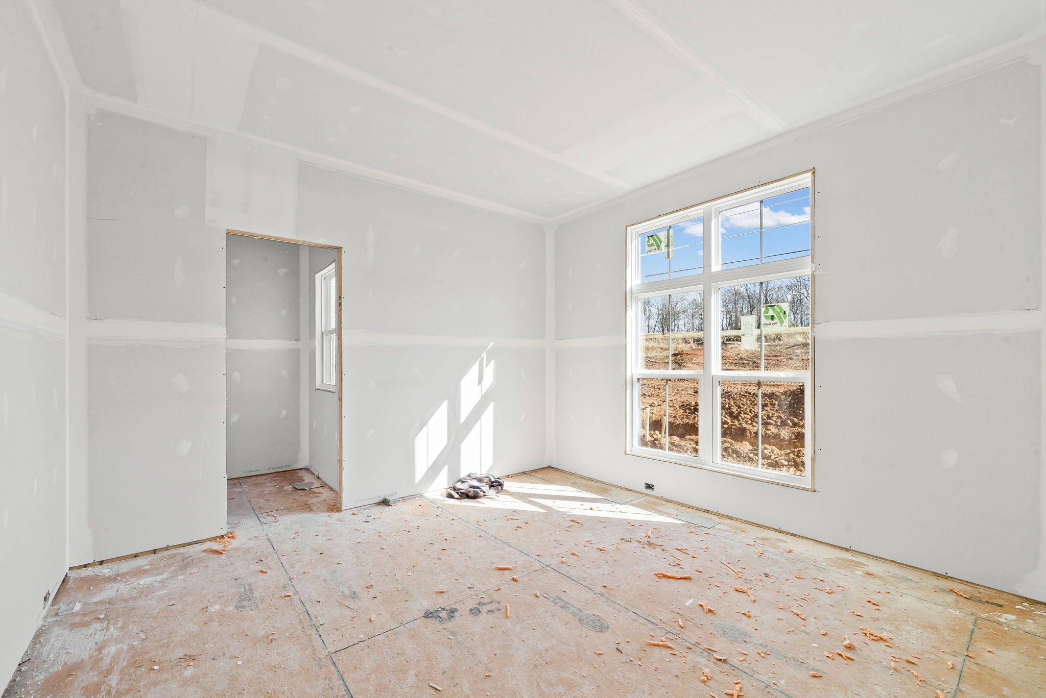 1307 Shady Grove Road Clarksville, TN 37043 - Photo 5 of 24 a view of a livingroom with wooden floor and a window