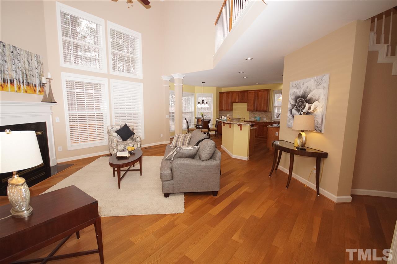 12520 Amoretto Way Raleigh, NC 27613 - Photo 13 of 25 a living room with furniture and a table