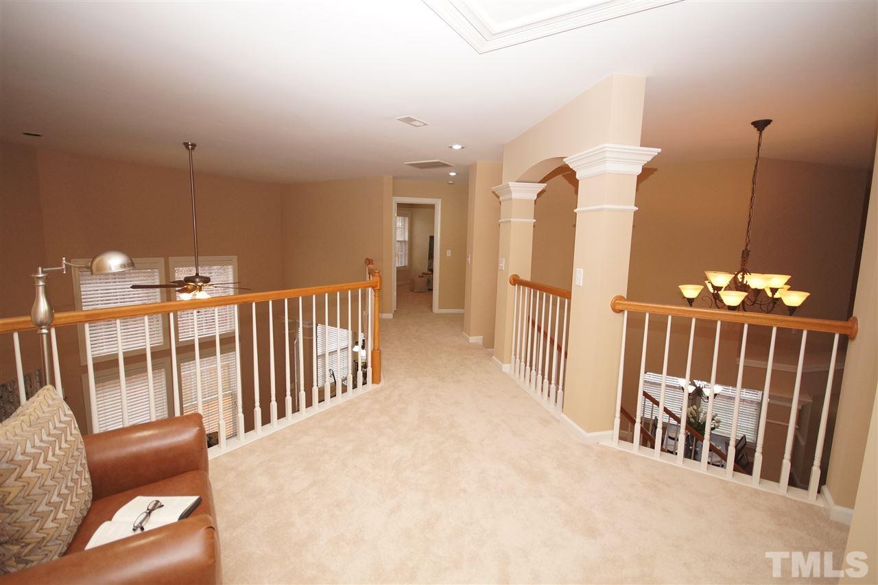12520 Amoretto Way Raleigh, NC 27613 - Photo 21 of 25 a view of a livingroom with furniture and stairs