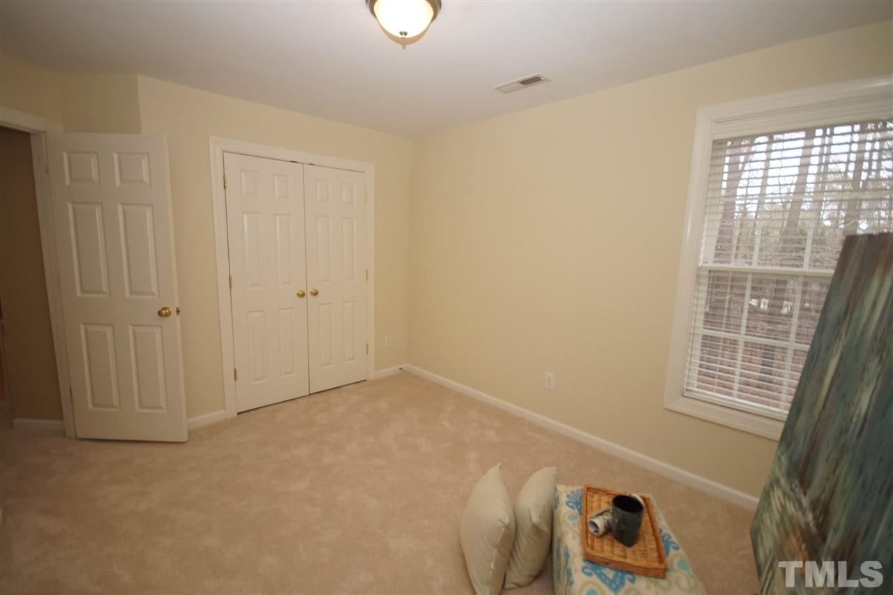 12520 Amoretto Way Raleigh, NC 27613 - Photo 22 of 25 a view of an empty room with a window