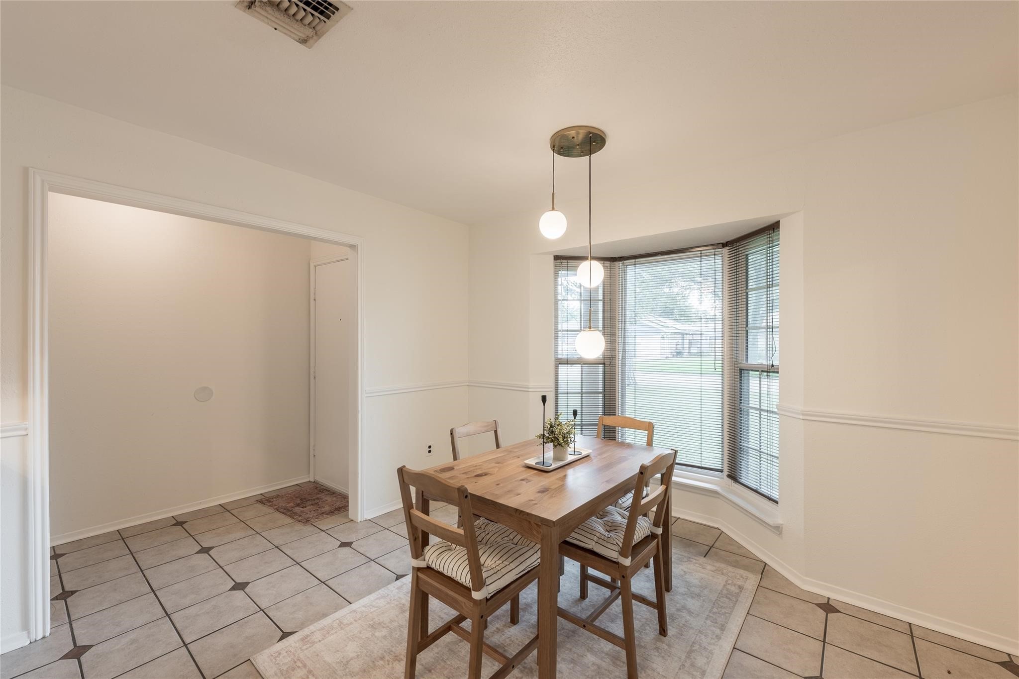1663 Chilton Lane Katy, TX 77493 - Photo 4 of 11 Dining room with updated lighting.
