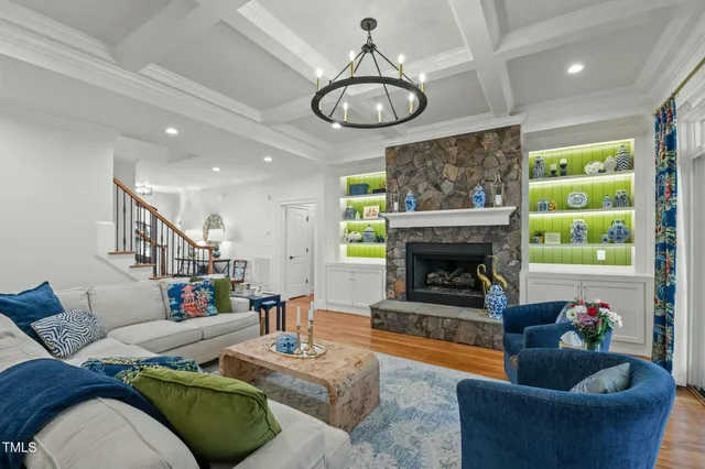 a bedroom with a bed and a lamp on dresser