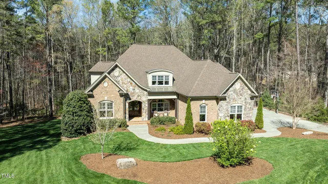a white bath tub sitting next to a window