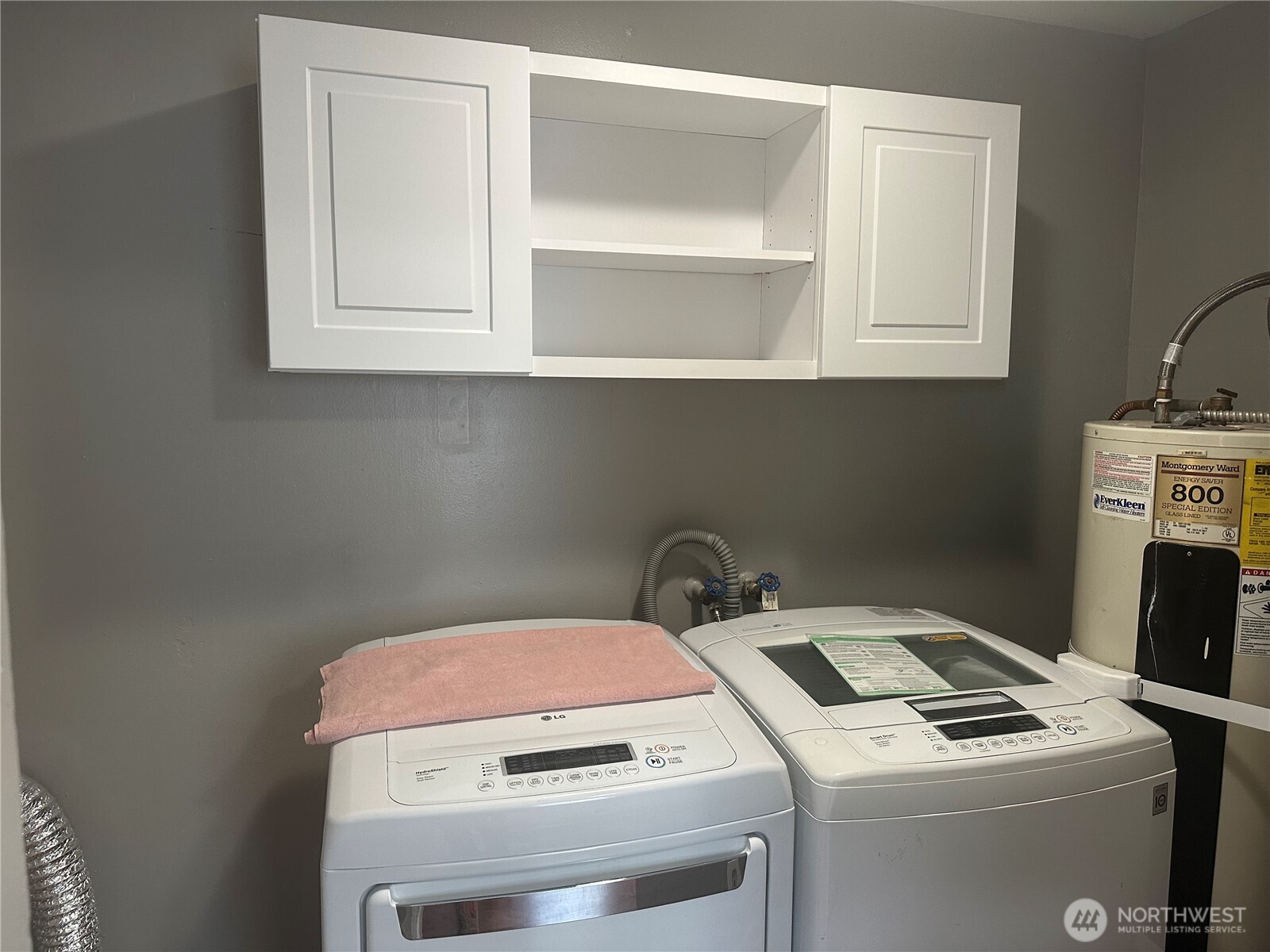 3153 Florida Street Longview, WA 98632 - Photo 26 of 27 a utility room with dryer and washer