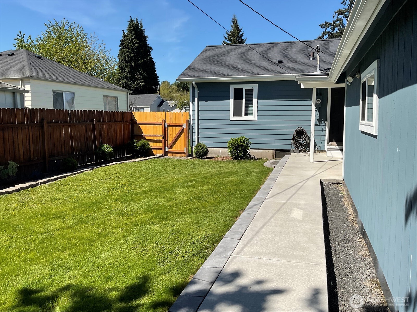 3153 Florida Street Longview, WA 98632 - Photo 5 of 27 a front view of a house with a yard