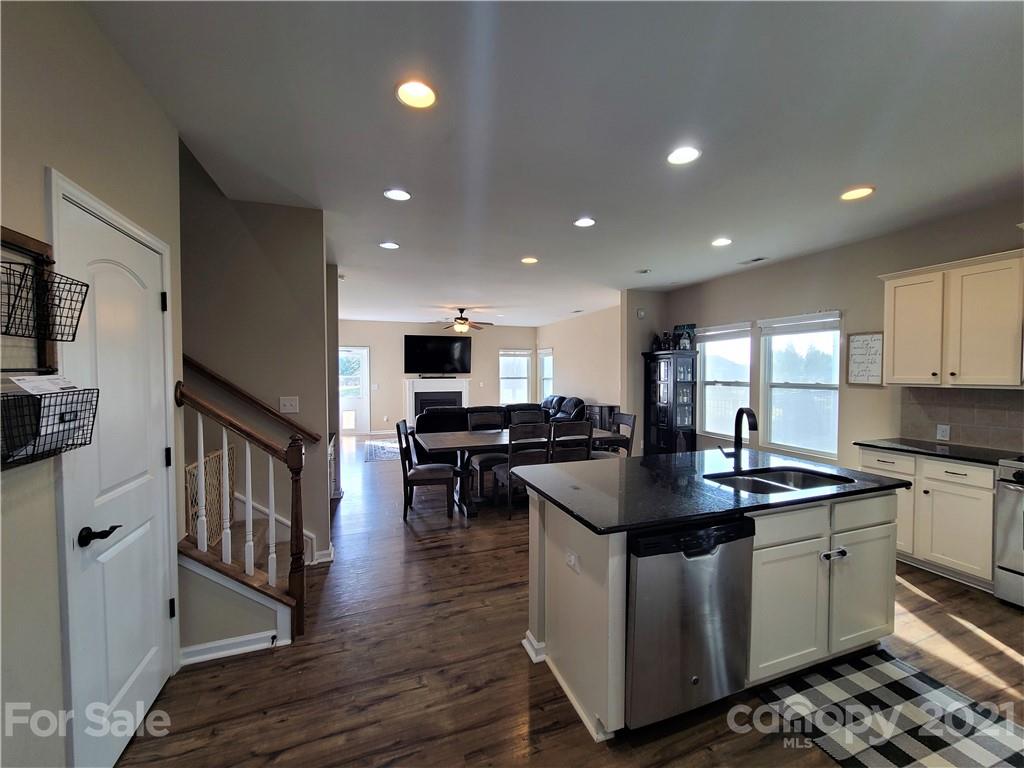 79315 Ridgehaven Road Lancaster, SC 29720 - Photo 2 of 41 a kitchen with stainless steel appliances granite countertop a sink stove and refrigerator