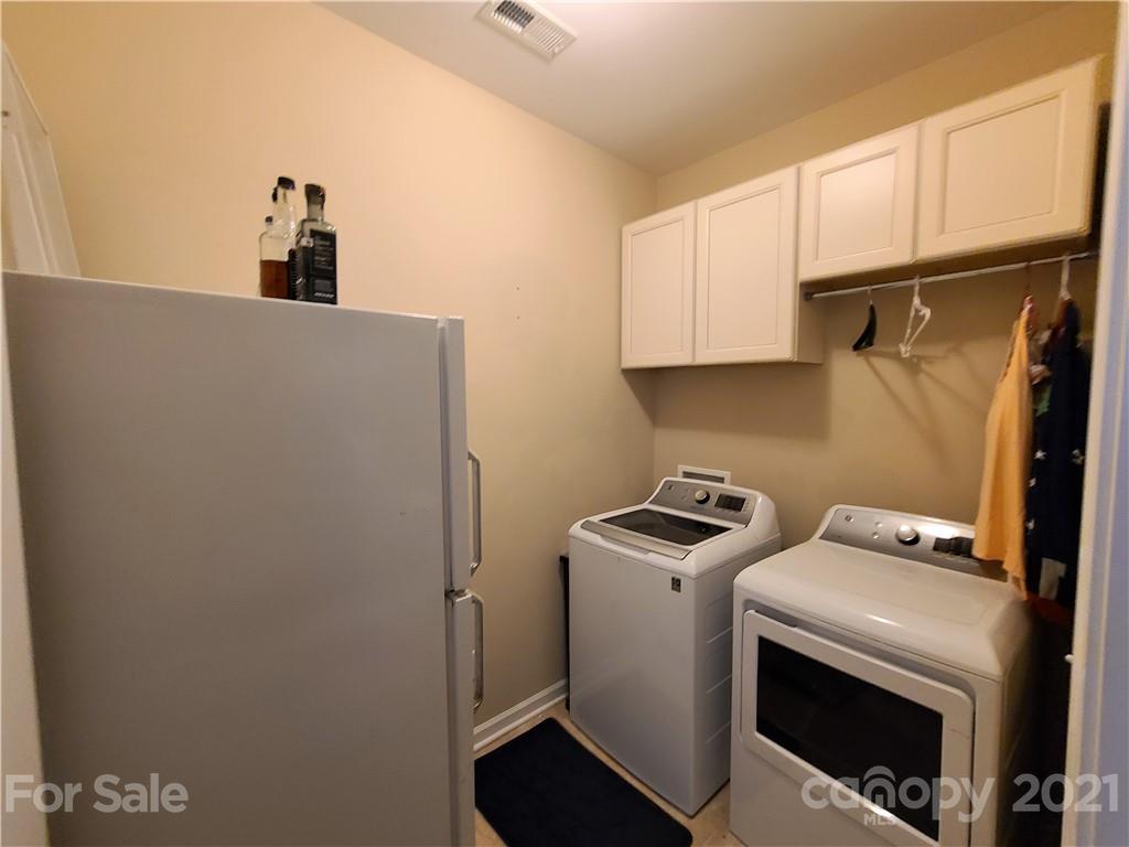 79315 Ridgehaven Road Lancaster, SC 29720 - Photo 19 of 41 a utility room with dryer and washer