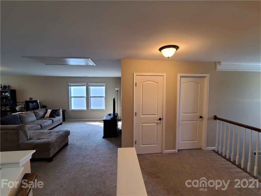 79315 Ridgehaven Road Lancaster, SC 29720 - Photo 21 of 41 a living room with furniture and a window