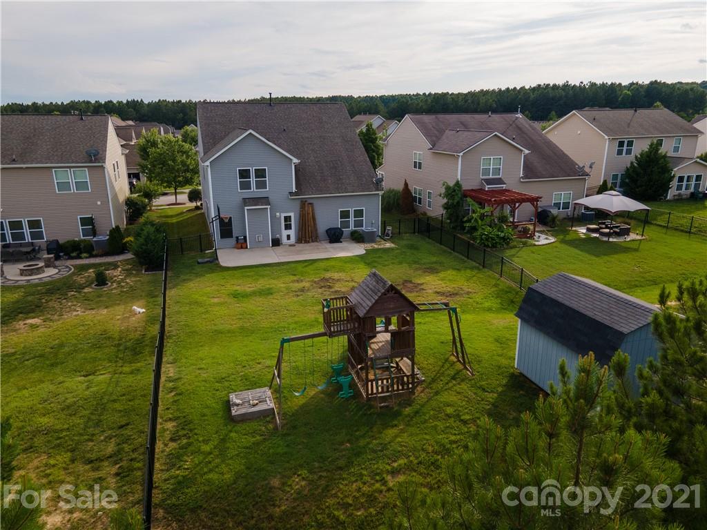 79315 Ridgehaven Road Lancaster, SC 29720 - Photo 5 of 41 an aerial view of residential houses with outdoor space and trees