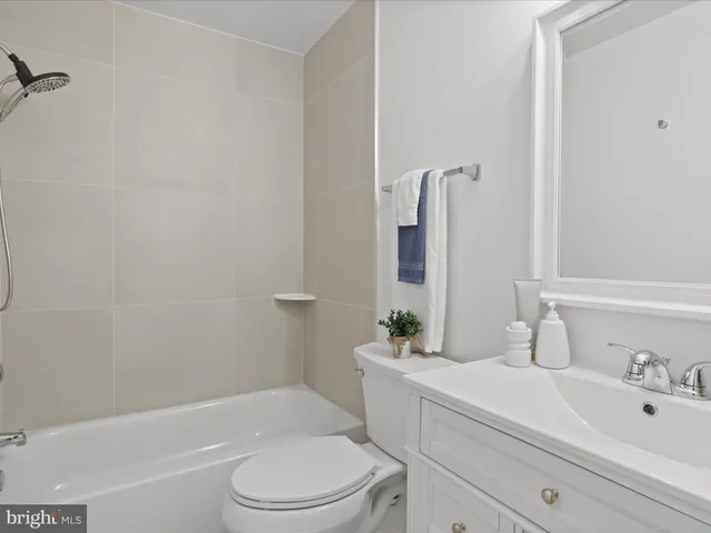 a view of a room with wooden walls