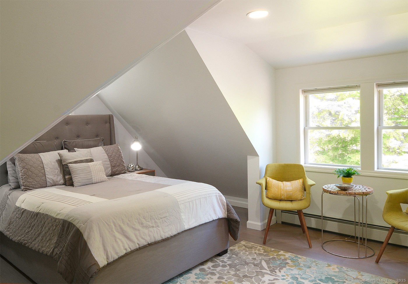 21 Perry Street Salisbury, CT 06039 - Photo 13 of 22 a bedroom with a bed and a couch next to a window