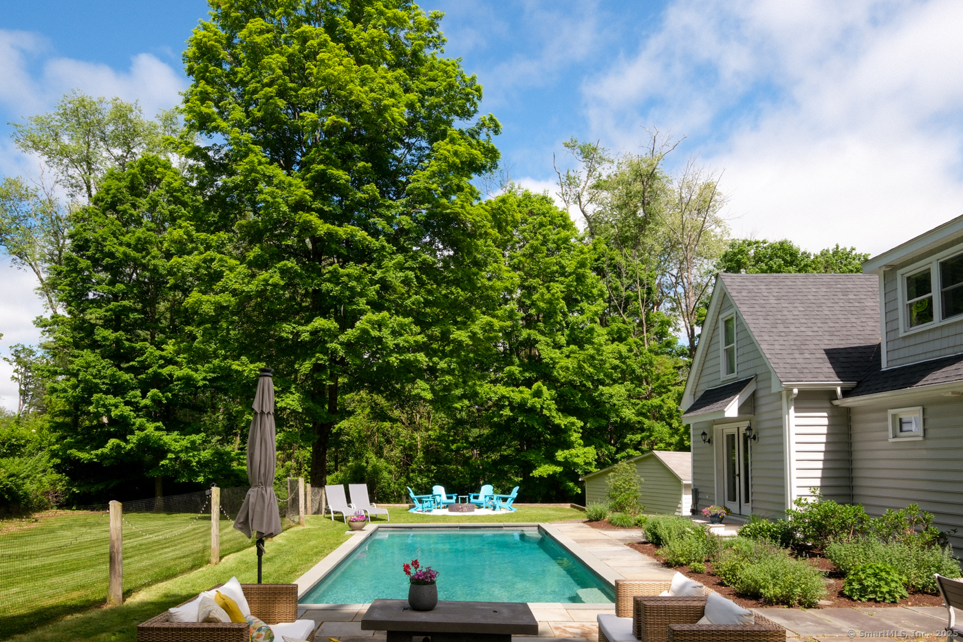 21 Perry Street Salisbury, CT 06039 - Photo 18 of 22 a view of yard with swimming pool and seating space