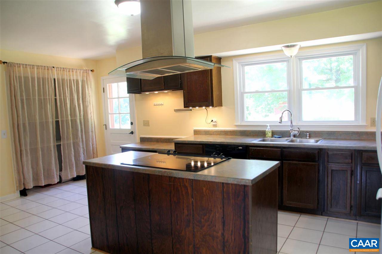 2071 Wilderness Road Reva, VA 22735 - Photo 8 of 33 a kitchen with kitchen island granite countertop a sink and a stove