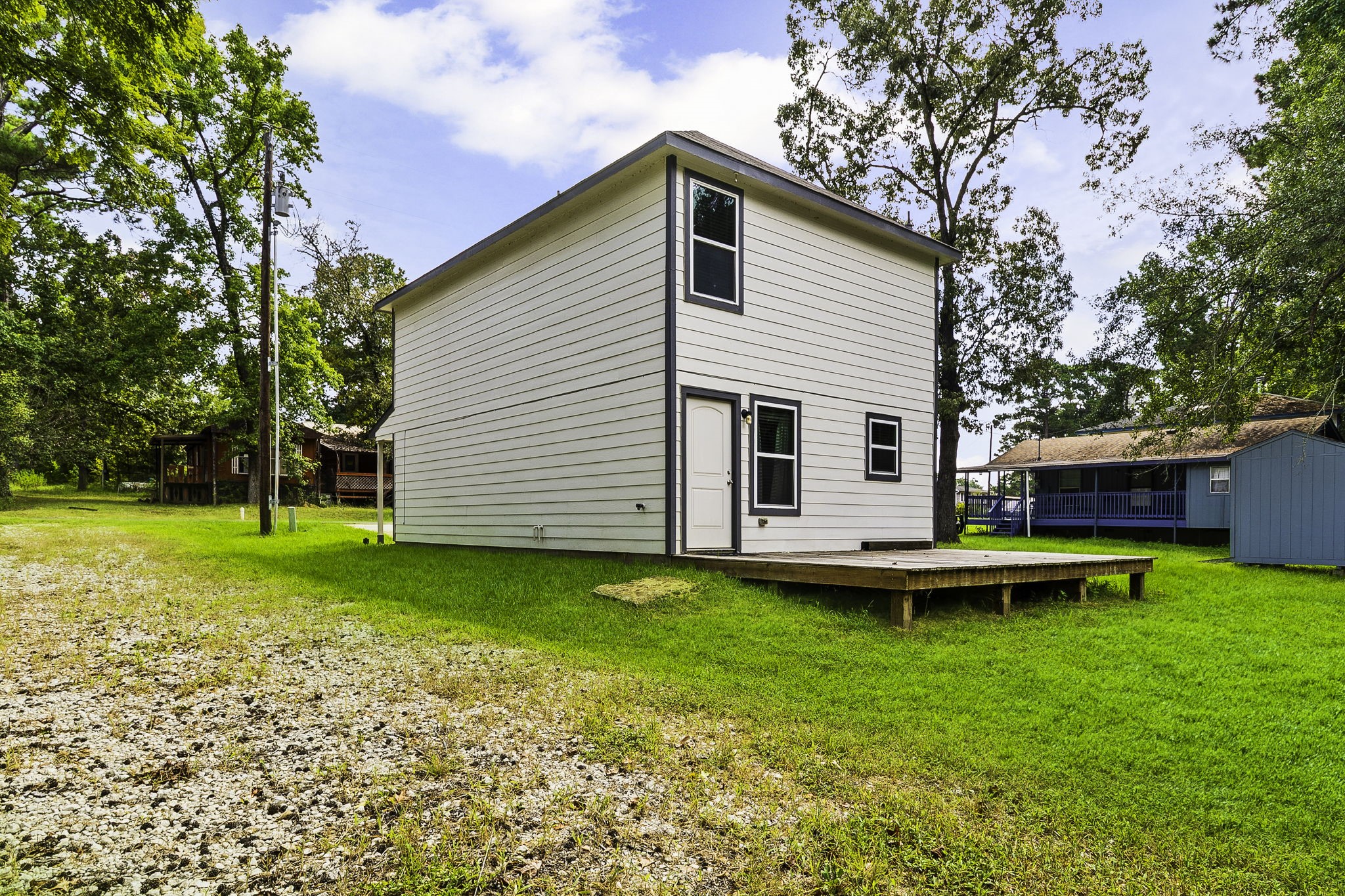 Tb Apple Tree Livingston, TX 77351 - Photo 23 of 31 a view of a house with a backyard