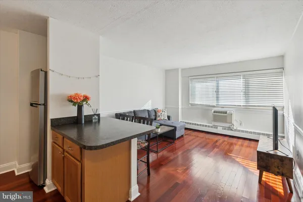 a workspace with furniture and window