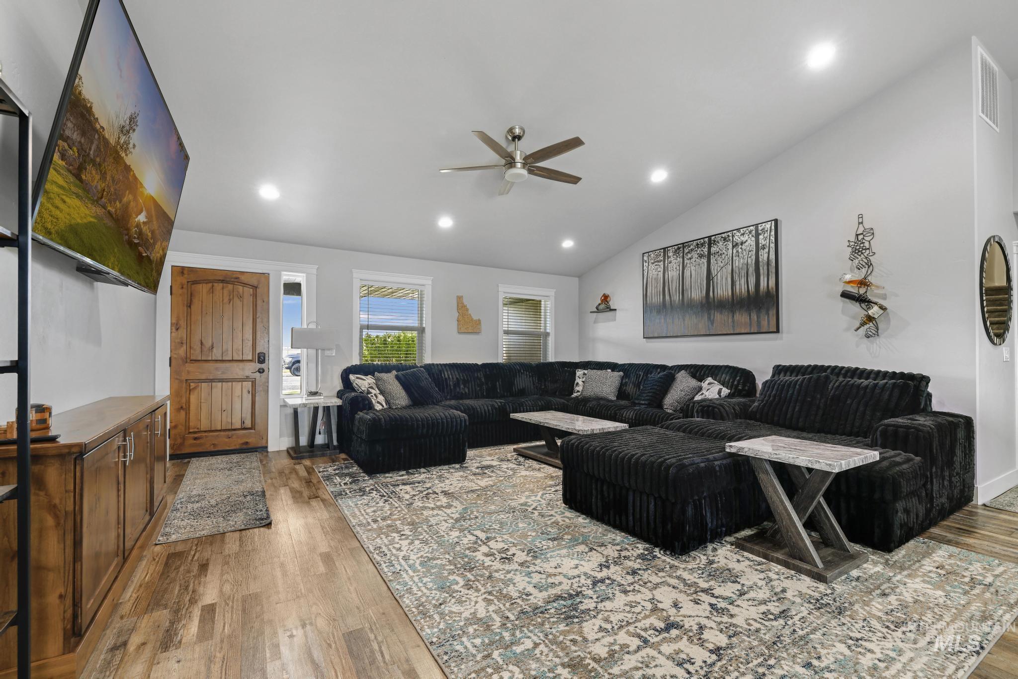 1150 Kimberly Meadows Road Kimberly, ID 83341 - Photo 4 of 32 Spacious living area featuring vaulted ceilings, recessed lighting, and wood-finish flooring