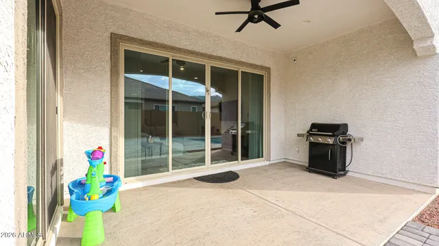 a view of a white house with a large windows