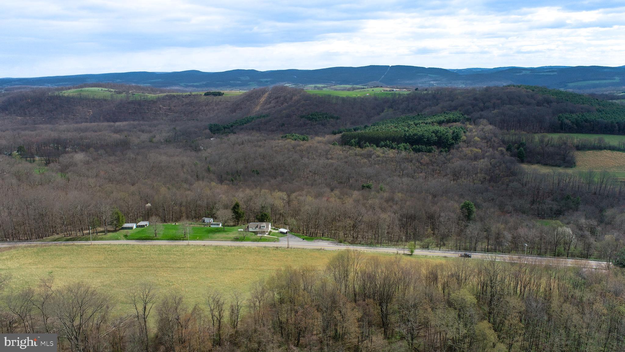 10785 Friendsville Road Friendsville, MD 21531 - Photo 13 of 19 a view of a town with mountains in the background