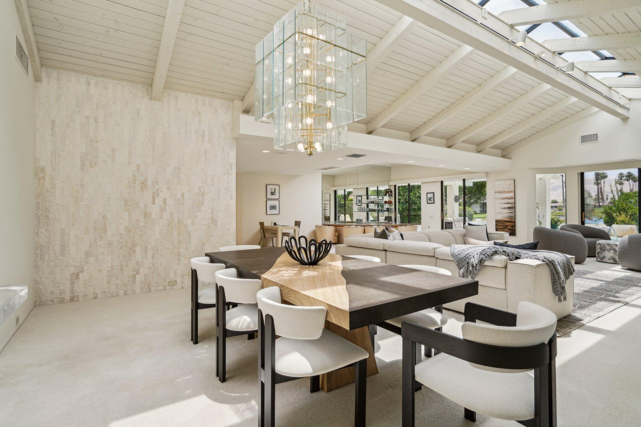23 Park Lane Rancho Mirage, CA 92270 - Photo 14 of 57 a view of a dining room with furniture and chandelier