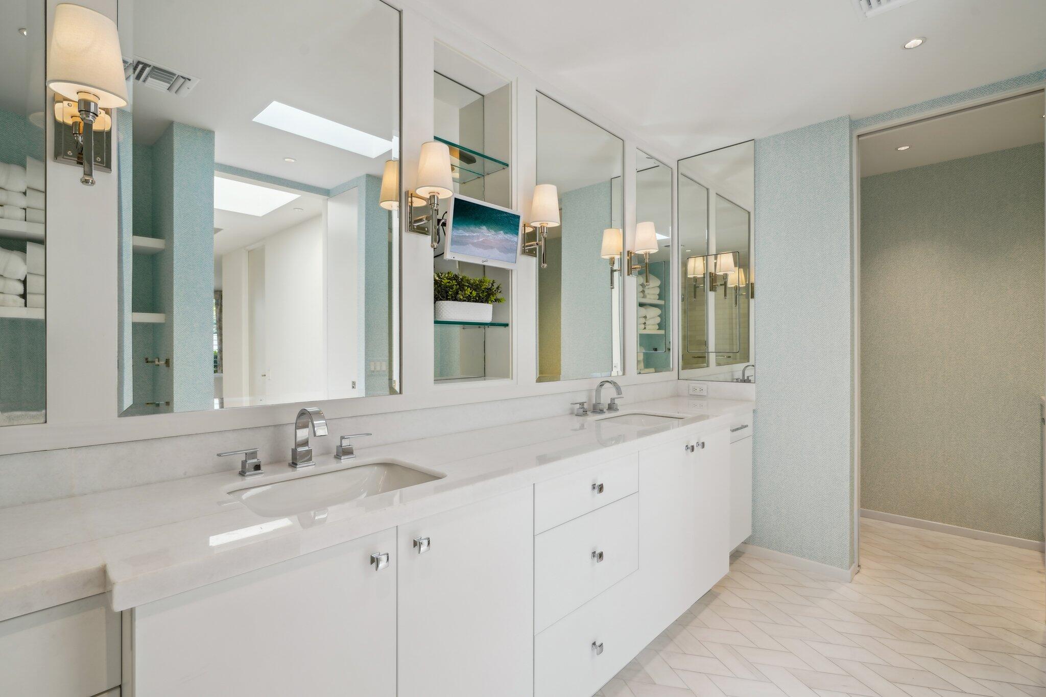 23 Park Lane Rancho Mirage, CA 92270 - Photo 37 of 57 a bathroom with a double vanity sink and mirror