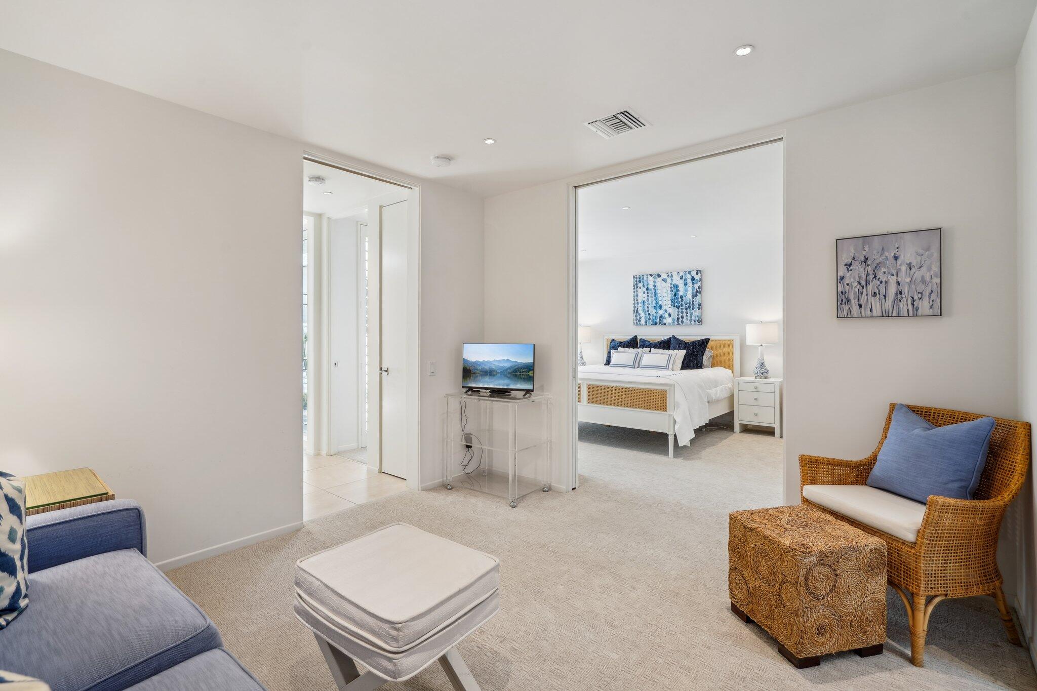 23 Park Lane Rancho Mirage, CA 92270 - Photo 43 of 57 a living room with furniture and a window