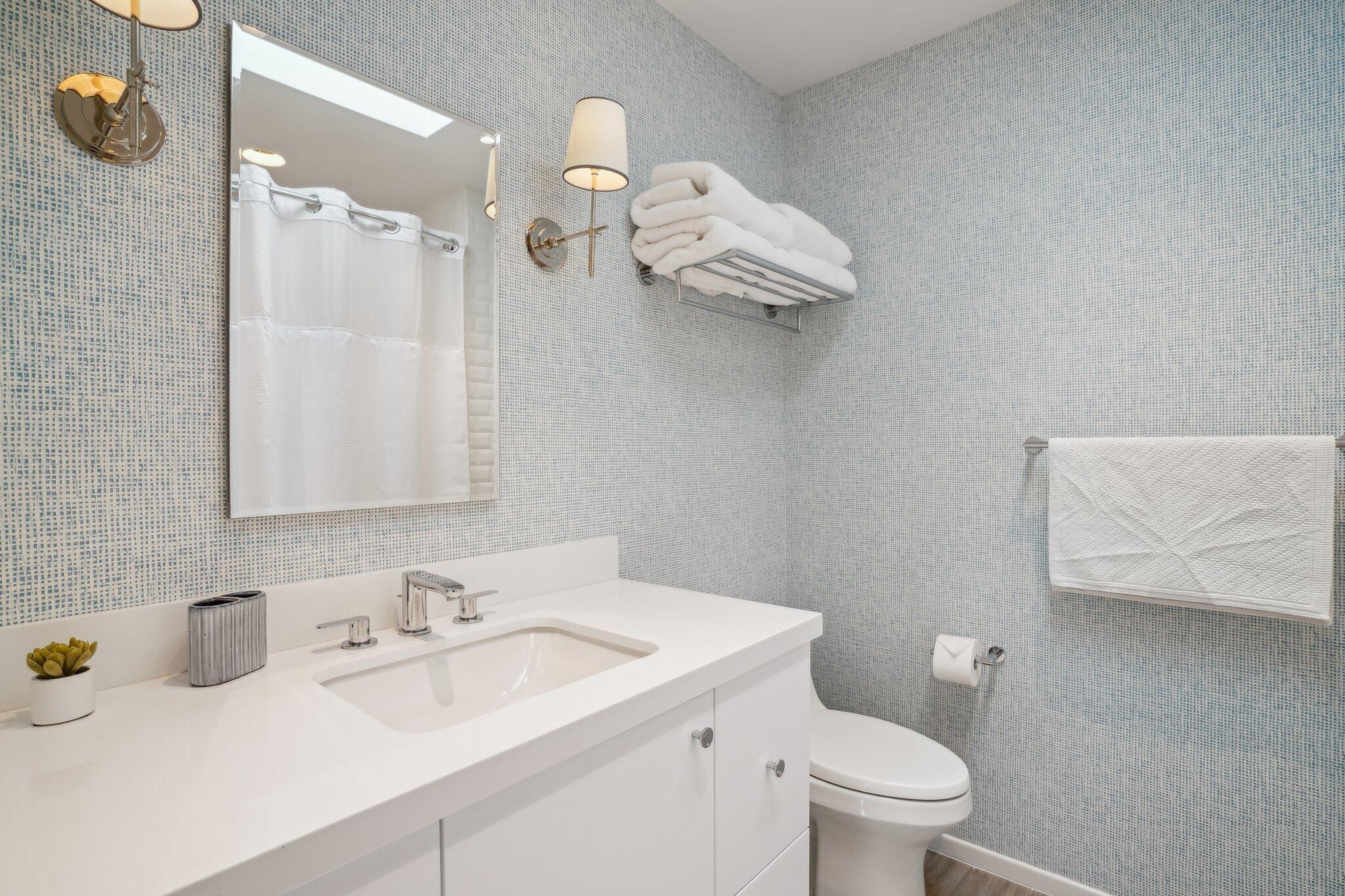 23 Park Lane Rancho Mirage, CA 92270 - Photo 45 of 57 a bathroom with a sink vanity mirror and toilet