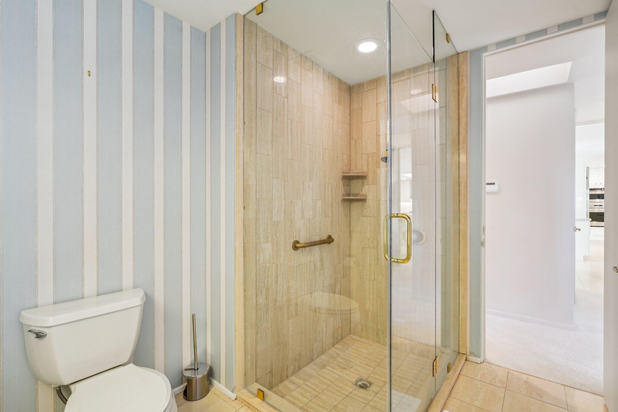 23 Park Lane Rancho Mirage, CA 92270 - Photo 53 of 57 a bathroom with a shower and a toilet