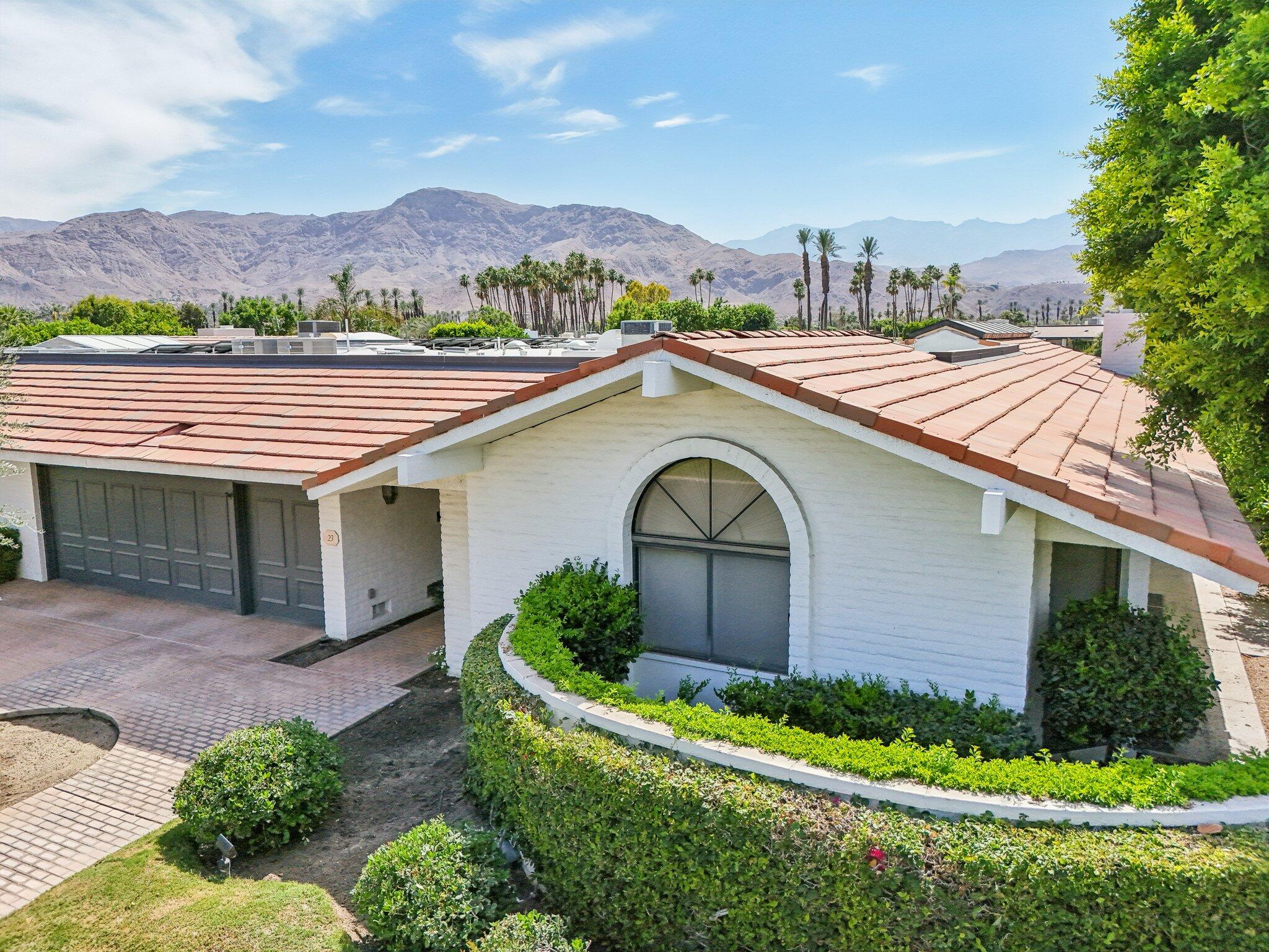23 Park Lane Rancho Mirage, CA 92270 - Photo 54 of 57 a view of a house with a yard and plants