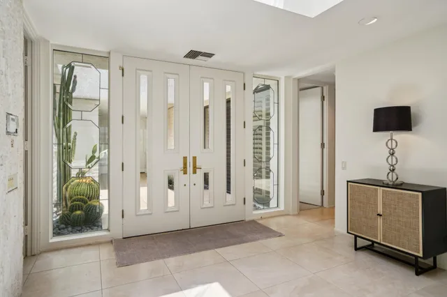 a view of a garden with houses