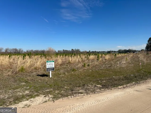 a view of a lake with a building in the background