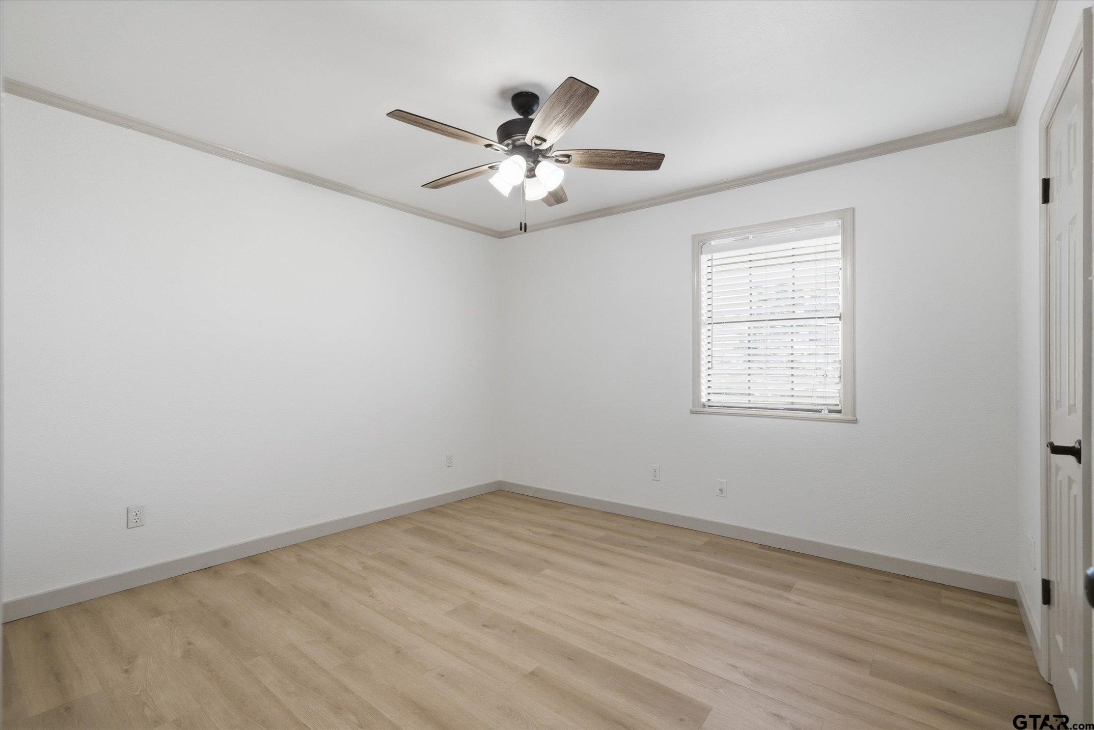 3360 Fm 1805 Van, TX 75790 - Photo 18 of 46 wooden floor in an empty room with a window
