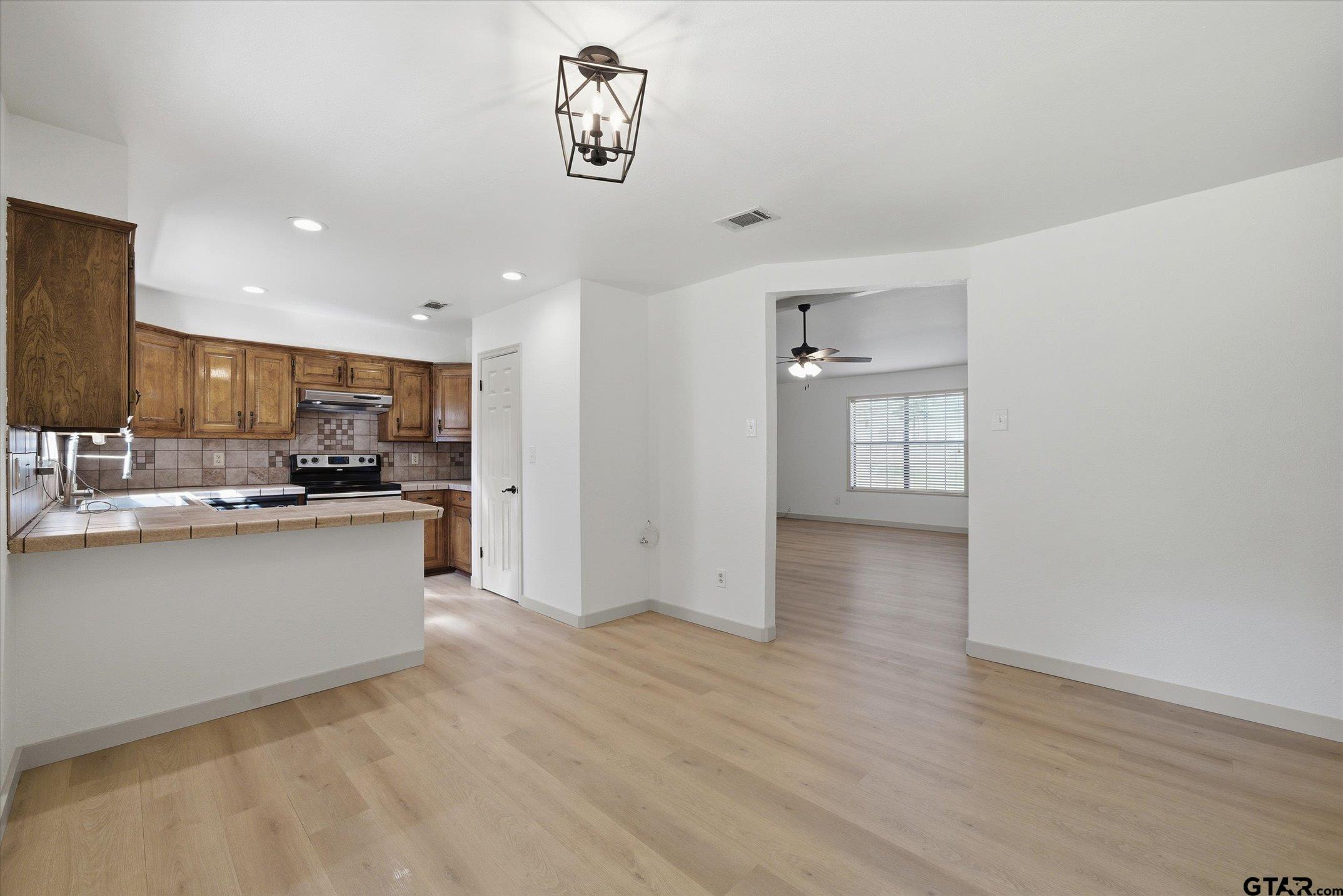 3360 Fm 1805 Van, TX 75790 - Photo 10 of 46 a view of a kitchen with a sink and refrigerator