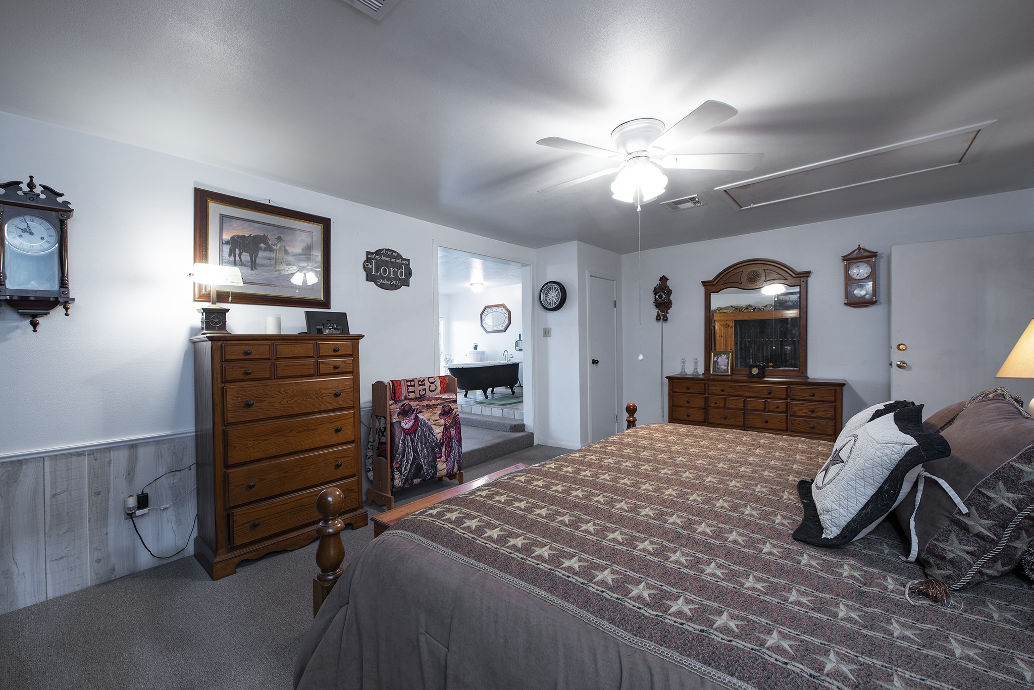 22234 Castle Road Waller, TX 77484 - Photo 26 of 50 a bedroom with a bed and a dresser