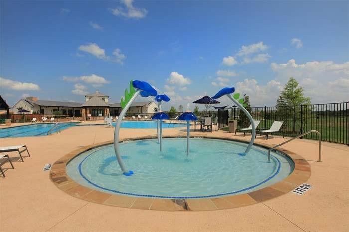 2226 Nightgrove Circle Crandall, TX 75114 - Photo 4 of 19 a view of a swimming pool with outdoor seating