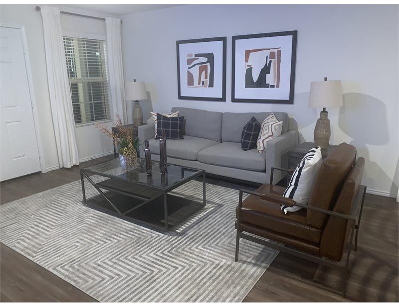 2226 Nightgrove Circle Crandall, TX 75114 - Photo 10 of 19 a living room with furniture and wooden floor