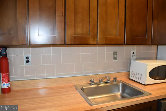 a bathroom with a sink and a bathtub