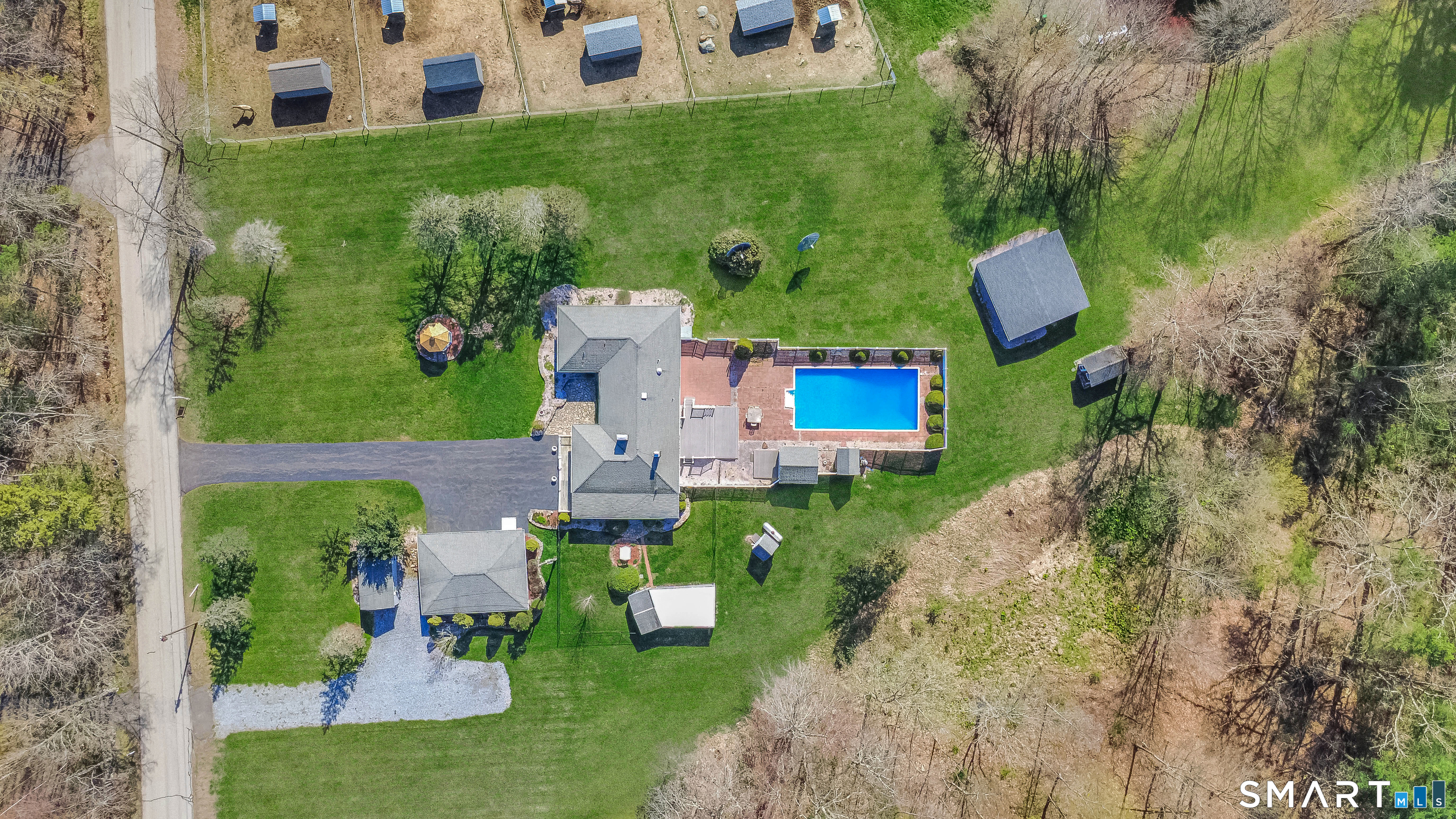 28 Cemetery Road Willington, CT 06279 - Photo 1 of 40 an aerial view of a house with yard swimming pool and outdoor seating
