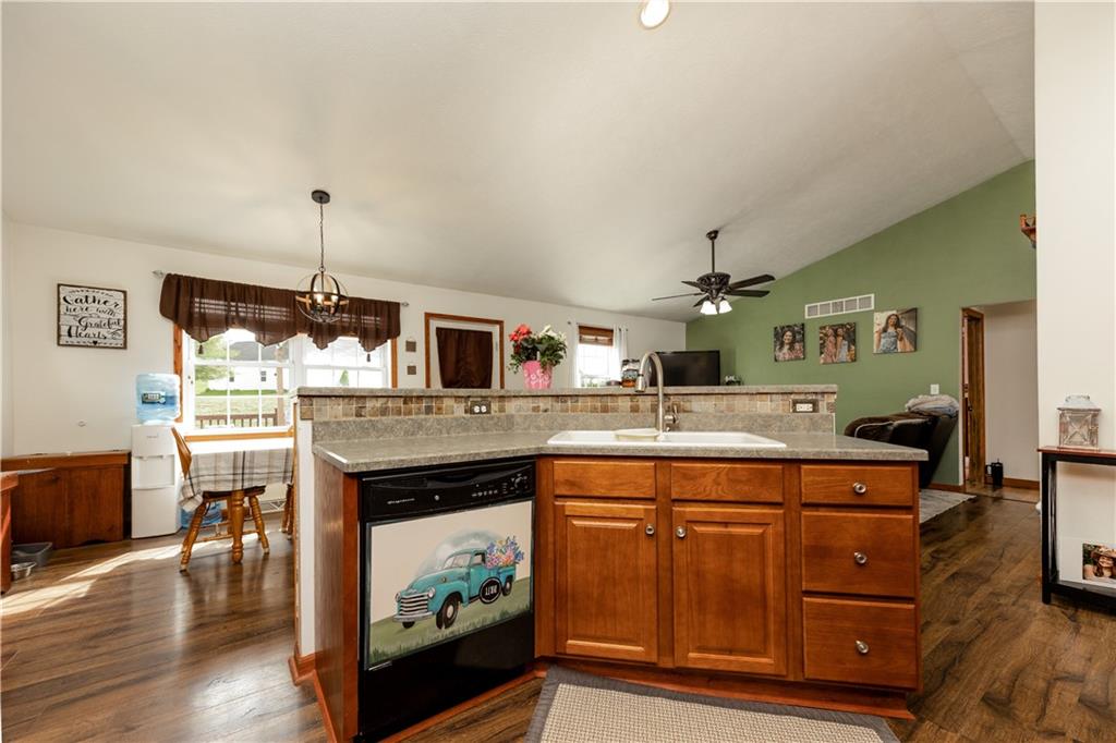 200 Shields Road Slippery Rock, PA 16057 - Photo 12 of 43 a kitchen with a stove and a wooden floor