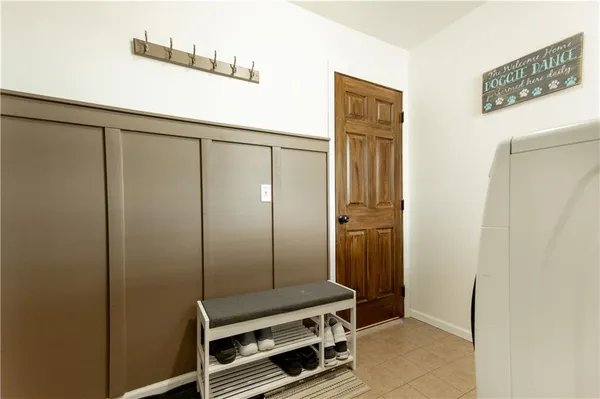 a bedroom with a bed and a closet