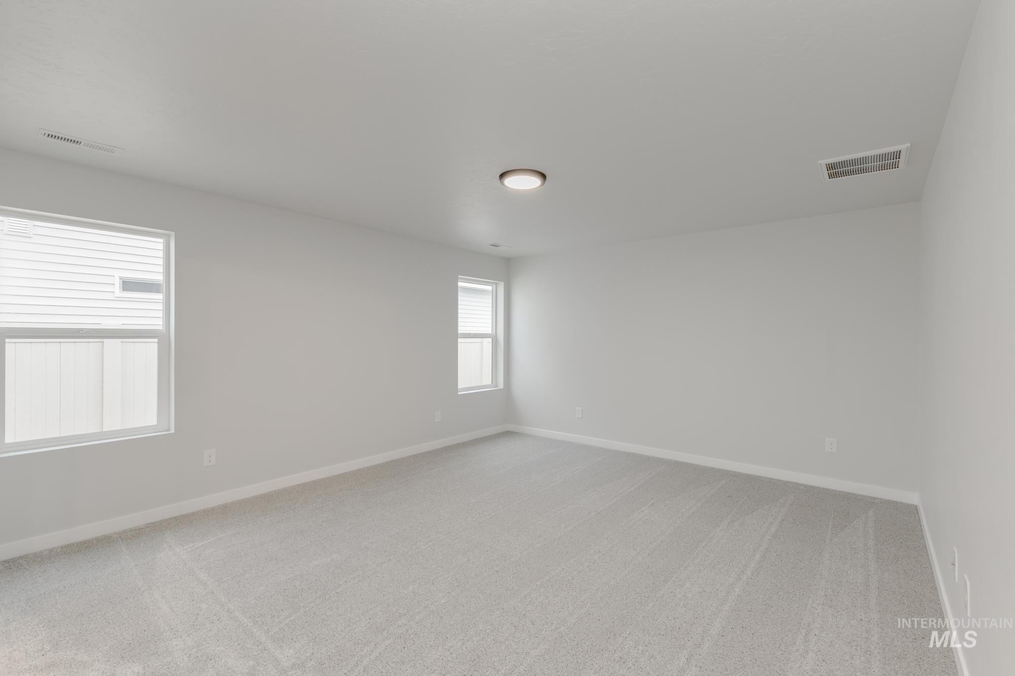 16329 Fill Avenue Caldwell, ID 83607 - Photo 15 of 18 Unfurnished room with light carpet