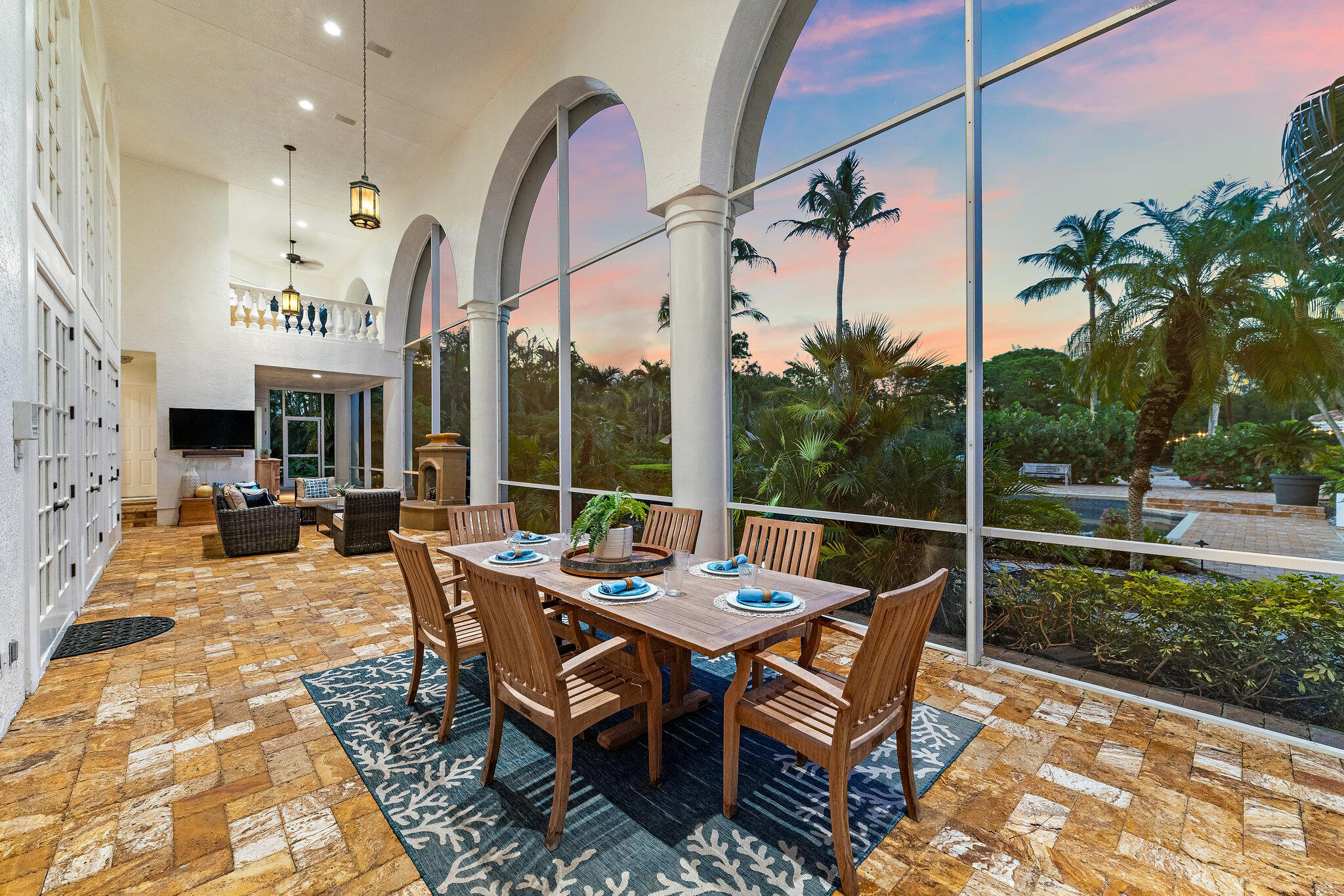 2584 Southeast Ranch Acres Circle Jupiter, FL 33478 - Photo 73 of 83 Covered Balcony at Dusk