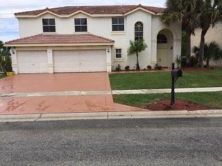 10975 Ravel Court Boca Raton, FL 33498 - Photo 1 of 4 FRONT VIEW