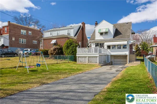 a view of a house with a swimming pool