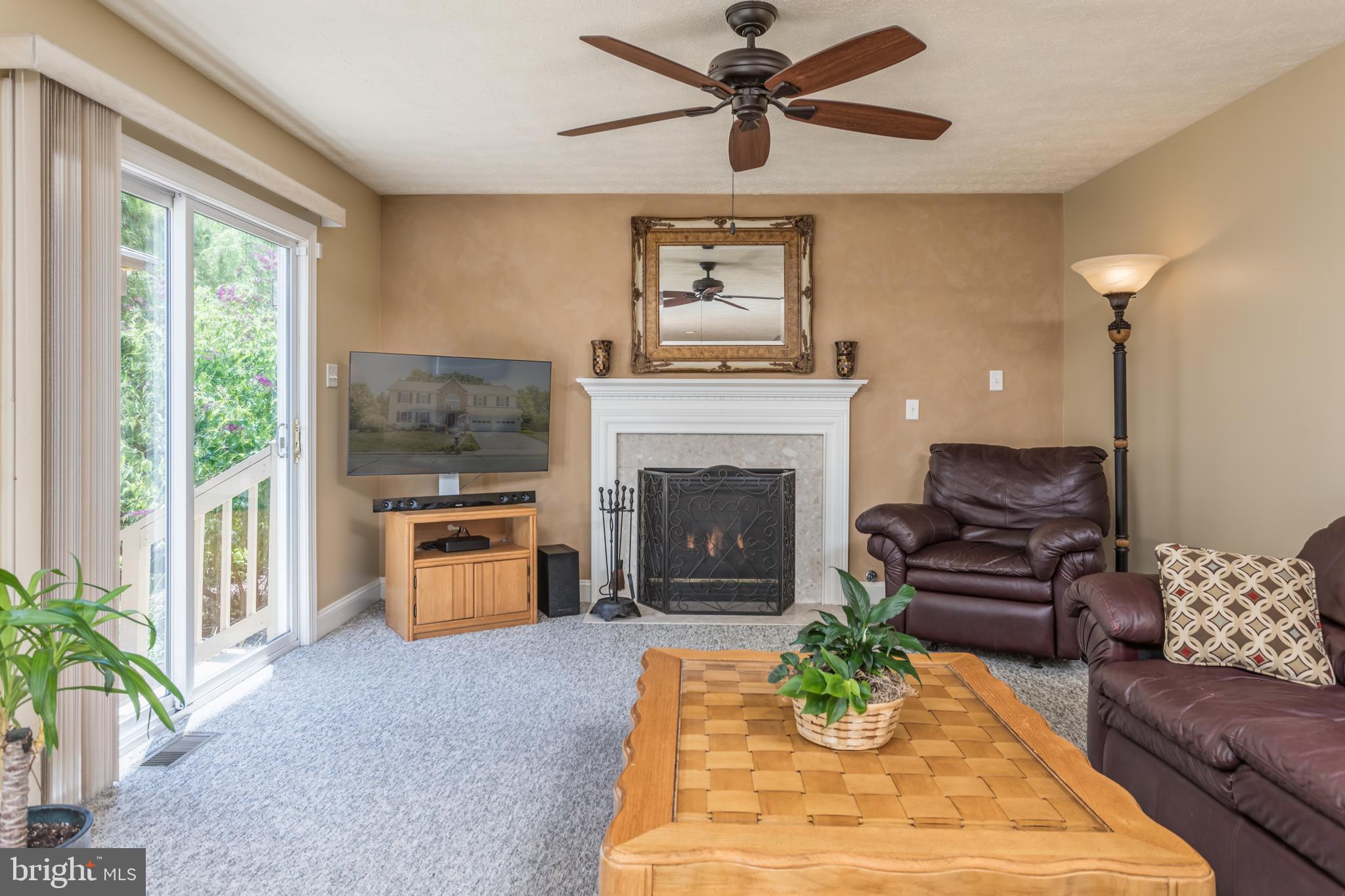 286 Huntersridge Road Winchester, VA 22602 - Photo 12 of 42 Family Room opens to Stamped Patio with Gazebo!
