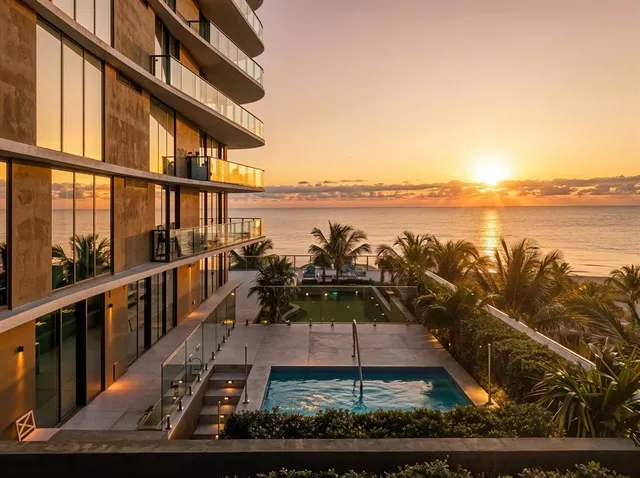 swimming pool view with a lake view