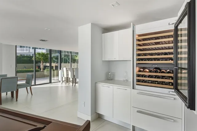a kitchen with counter top stainless steel appliances and cabinets