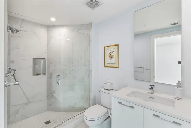 a view of a storage & utility room with a washer dryer