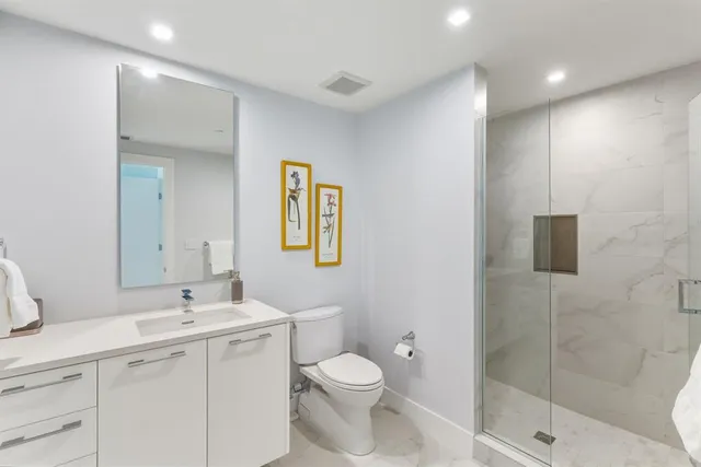 a view of a swimming pool with an outdoor seating