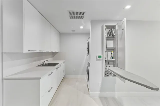 a view of a tall building from a balcony